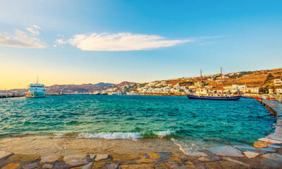 View of the Mykonos island from seafront at sunset