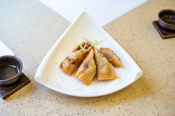 Chinese Cantonese-style morning tea and fried chicken spring rolls