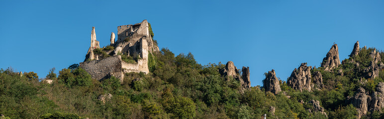 Fototapeta premium Panorama of Duernstein castle in Autumn in the Wachau Valley, Austria