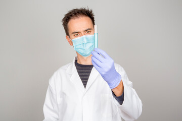 doctor in laboratory investigating covid 19 coronavirus vaccine