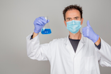 doctor in laboratory investigating covid 19 coronavirus vaccine