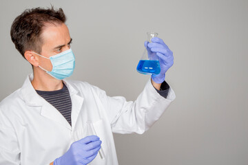 doctor in laboratory investigating covid 19 coronavirus vaccine