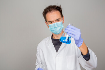 doctor in laboratory investigating covid 19 coronavirus vaccine