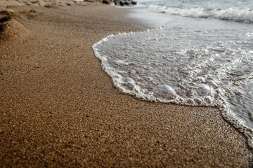 The bubble wave on the sand.