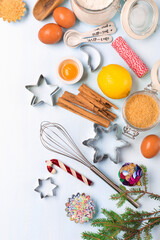 Ingredients for Christmas baking - flour, spices, eggs and cookie cutters.
