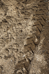 Wheel track on dirty mud