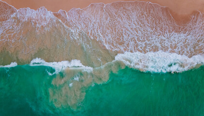Fototapeta na wymiar Aerial of waves on the beach, Oahu, Hawaii