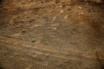 Wheel track on dirty mud