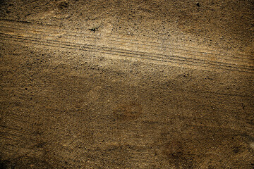 Wheel track on dirty mud