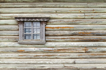 Old grungy green wooden wall with window