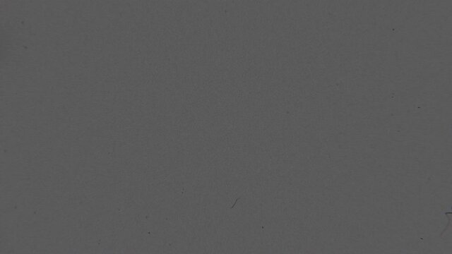 Dynamic film noise and grain texture with blinking effect. Super 35mm tape. Overlay mode for your footage. Perforation holes or perfs. Dust, hair, scratches analogue artifacts. Retro vintage template
