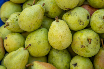 Organic market fresh Pears on an agricultural market at the mediterranean region in Turkey.