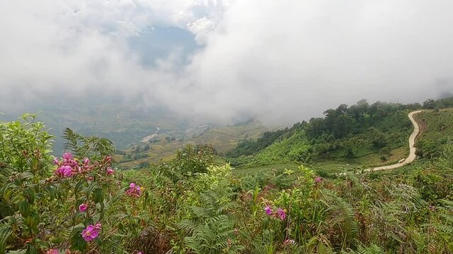 Flying clouds over terraced rice fields in Y Ty, Bat Xat district, Yen Bai province, Vietnam.