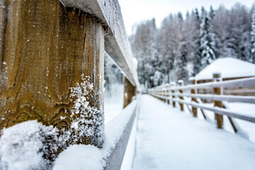 Large wooden staircase in a winter park. Beautiful winter landscape