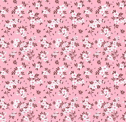 Floral pattern. Pretty flowers on light pink background. Printing with small white flowers. Ditsy print. Seamless vector texture. Spring bouquet.