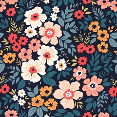 Fotobehang Vintage floral background. Seamless vector pattern for design and fashion prints. Flowers pattern with small colorful flowers on a dark blue background. Ditsy style. © ann_and_pen