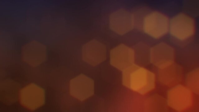 Lens glow bokeh, dynamic blur. Unfocused particle motion with depth of field effect. Holiday concept backdrop with twinkling bright polygonal shapes. Festive footage in 4K