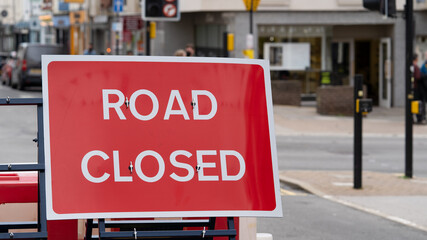 Road closed sign closing a street to cars during a pandemic