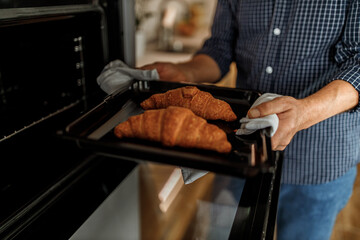 Two croissants with marmalade.