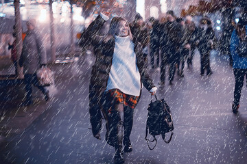 christmas rain woman, young girl model in coat outside on christmas night