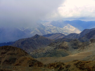 Fototapeta premium Climbing up to the Khardungla pass and enjoying the Himalayan mountains view, Jammu and Kashmir, Ladakh, India 