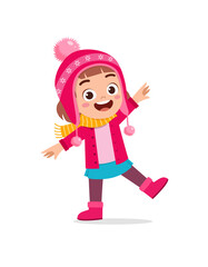 happy cute little kid play and wear jacket in winter season. child smile wearing warm clothes