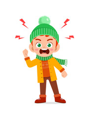 angry cute little kid scream and wear jacket in winter season. child shout wearing warm clothes