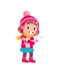 happy cute little kid play and wear jacket in winter season. child feeling chill wearing warm clothes