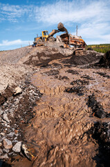 Industrial equipment in the mountainous region of Eastern Siberia, where natural gold is mined.
    Several tons of mountain soil are poured into the hopper of this device, and all this is washed out 