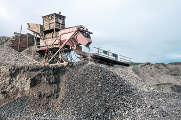 Industrial equipment in the mountainous region of Eastern Siberia, where natural gold is mined.
    Several tons of mountain soil are poured into the hopper of this device, and all this is washed out 