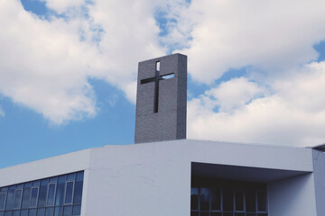 church building, the cross on tne building, the cross with clear blue sky, cloud sky, morning sight