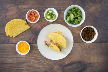 Crunchy Beef Tacos on a Wooden Table