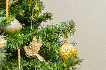 close up of christmas tree decoration with baubles and garland. Festive greeting card for winter holidays.