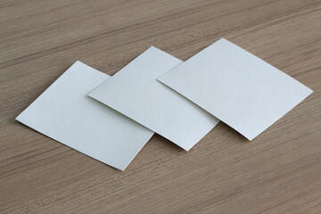 Fototapeta premium sheet paper on wood background with copy space for text