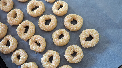sesame pastries, small bagels with sesame seeds stuck to the dough,
