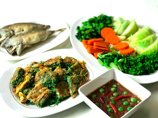Close up Spicy shrimp paste (Nam Prik Kapi) and Climbing Wattle (cha-om) Omelettes, Best Thai menu.