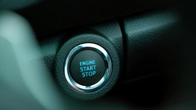 Pushing power ignition button to start keyless ignition hybrid car engine