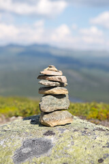 Stacked stones on top mountain in nature, selective focus on stones