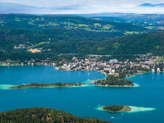 Fototapeta na wymiar Summer panoramic view of the lakes Woerth in Klagenfurt.