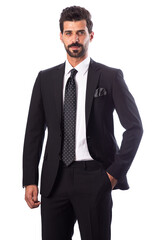 A young man wearing a black suit on a white background