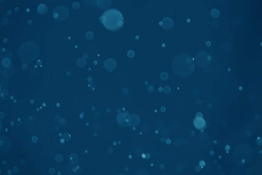 abstract blue bokeh background with light  dot pattern.