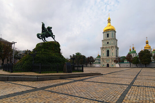 Wide-angle view of the ancient Saint Sophia Square with Bohdan Khmelnytsky Monument and Saint Sophia Cathedral with Bell tower. Famous touristic place and travel destination in Kyiv, Ukraine