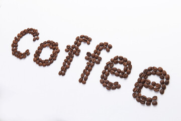word coffee lined with coffee beans