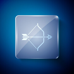 White Medieval bow and arrow icon isolated on blue background. Medieval weapon. Square glass panels. Vector.