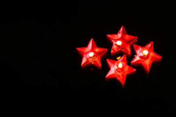 Indian festival diwali , candle on dark background