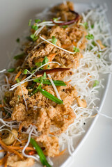 Calamari served with spicy and sweet dipping sauces. Classic American restaurant or French bistro appetizer favorite. Fresh octopus, squid and shrimp battered and deed fried.