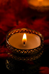 Indian festival diwali , candle on dark background