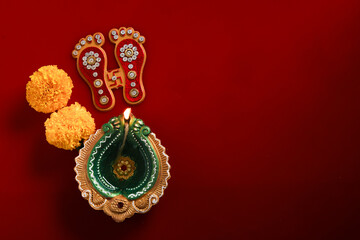 happy diwali or happy deepavali greeting card made using a photograph of diya or oil lamp