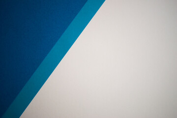 Blue and white colored paper background