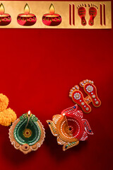 happy diwali or happy deepavali greeting card made using a photograph of diya or oil lamp
